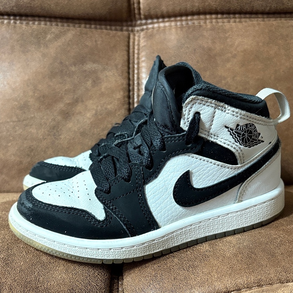 Jordan Kids Black and White High-Top Sneakers